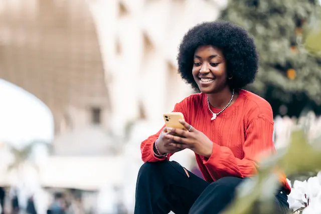 using-her-smart-phone-street (1)