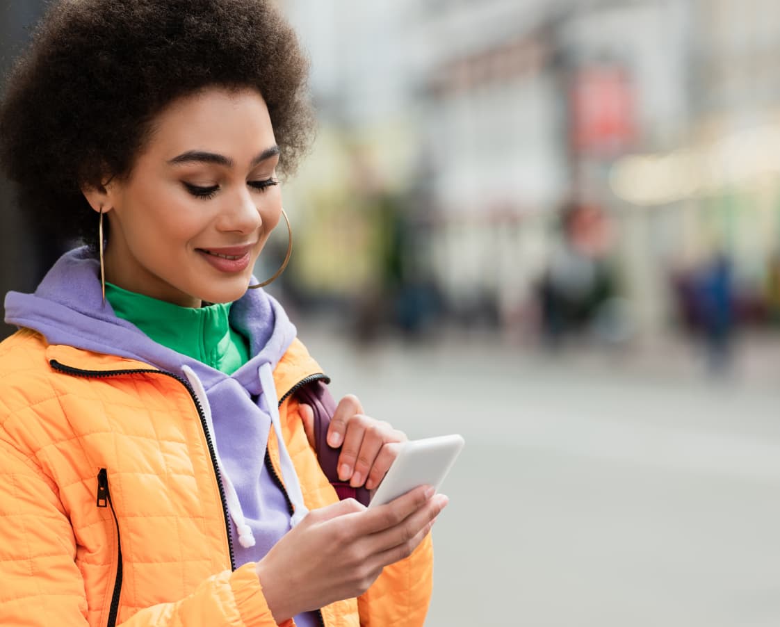 african-american-woman-with-backpack-using-mobile-2023-10-03-23-31-49-utc